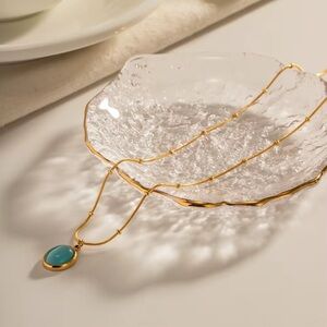 Elegant Gold and Blue Pendant Necklace
